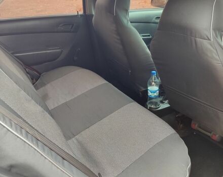 Красный Шевроле Авео, объемом двигателя 1.5 л и пробегом 239 тыс. км за 3200 $, фото 4 на Automoto.ua