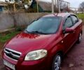 Красный Шевроле Авео, объемом двигателя 1.6 л и пробегом 244 тыс. км за 3300 $, фото 1 на Automoto.ua