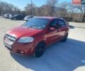 Красный Шевроле Авео, объемом двигателя 1.5 л и пробегом 186 тыс. км за 3800 $, фото 1 на Automoto.ua