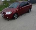 Красный Шевроле Авео, объемом двигателя 1.6 л и пробегом 246 тыс. км за 3999 $, фото 1 на Automoto.ua