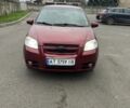 Красный Шевроле Авео, объемом двигателя 1.6 л и пробегом 210 тыс. км за 4300 $, фото 1 на Automoto.ua