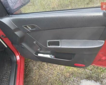 Красный Шевроле Авео, объемом двигателя 1.5 л и пробегом 215 тыс. км за 3000 $, фото 7 на Automoto.ua