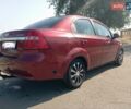 Красный Шевроле Авео, объемом двигателя 1.6 л и пробегом 261 тыс. км за 3600 $, фото 4 на Automoto.ua