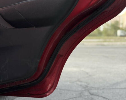 Червоний Шевроле Авео, об'ємом двигуна 1.5 л та пробігом 213 тис. км за 2600 $, фото 17 на Automoto.ua