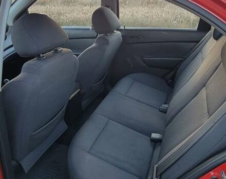 Красный Шевроле Авео, объемом двигателя 1.5 л и пробегом 151 тыс. км за 4900 $, фото 6 на Automoto.ua