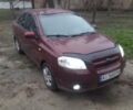 Красный Шевроле Авео, объемом двигателя 1.6 л и пробегом 209 тыс. км за 3500 $, фото 1 на Automoto.ua