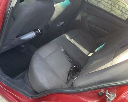 Червоний Шевроле Авео, об'ємом двигуна 1.4 л та пробігом 290 тис. км за 2900 $, фото 5 на Automoto.ua