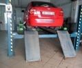 Красный Шевроле Авео, объемом двигателя 1.5 л и пробегом 300 тыс. км за 3500 $, фото 1 на Automoto.ua