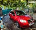 Красный Шевроле Авео, объемом двигателя 1.5 л и пробегом 148 тыс. км за 3999 $, фото 1 на Automoto.ua