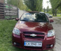Красный Шевроле Авео, объемом двигателя 1.6 л и пробегом 148 тыс. км за 4500 $, фото 2 на Automoto.ua