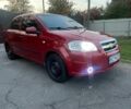 Красный Шевроле Авео, объемом двигателя 1.5 л и пробегом 260 тыс. км за 3500 $, фото 1 на Automoto.ua