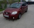 Красный Шевроле Авео, объемом двигателя 1.6 л и пробегом 245 тыс. км за 3690 $, фото 1 на Automoto.ua