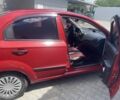 Красный Шевроле Авео, объемом двигателя 1.5 л и пробегом 296 тыс. км за 3600 $, фото 1 на Automoto.ua