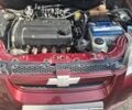Красный Шевроле Авео, объемом двигателя 1.6 л и пробегом 245 тыс. км за 3690 $, фото 2 на Automoto.ua