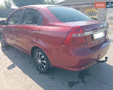 Красный Шевроле Авео, объемом двигателя 1.6 л и пробегом 261 тыс. км за 3600 $, фото 2 на Automoto.ua