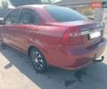 Красный Шевроле Авео, объемом двигателя 1.6 л и пробегом 261 тыс. км за 3600 $, фото 2 на Automoto.ua