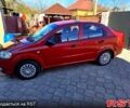 Красный Шевроле Авео, объемом двигателя 1.5 л и пробегом 200 тыс. км за 4000 $, фото 1 на Automoto.ua