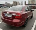 Красный Шевроле Авео, объемом двигателя 1.6 л и пробегом 158 тыс. км за 4600 $, фото 2 на Automoto.ua