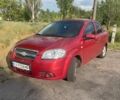 Красный Шевроле Авео, объемом двигателя 1.5 л и пробегом 133 тыс. км за 5400 $, фото 1 на Automoto.ua