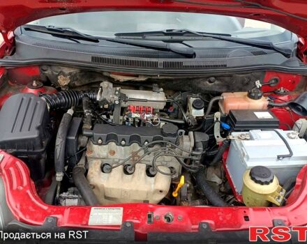 Красный Шевроле Авео, объемом двигателя 1.5 л и пробегом 307 тыс. км за 3800 $, фото 9 на Automoto.ua