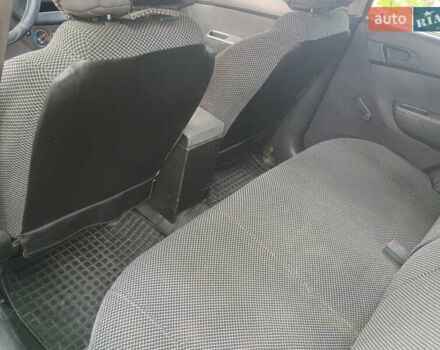Красный Шевроле Авео, объемом двигателя 1.5 л и пробегом 260 тыс. км за 3600 $, фото 1 на Automoto.ua