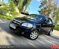 Червоний Шевроле Авео, об'ємом двигуна 2.4 л та пробігом 170 тис. км за 4790 $, фото 1 на Automoto.ua