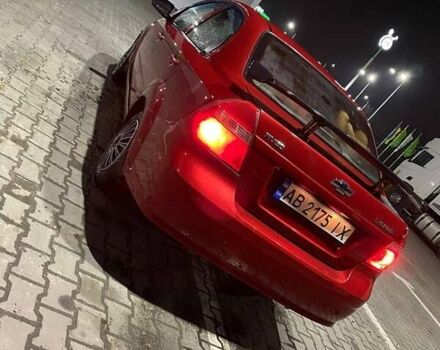 Червоний Шевроле Авео, об'ємом двигуна 1.5 л та пробігом 295 тис. км за 4499 $, фото 4 на Automoto.ua