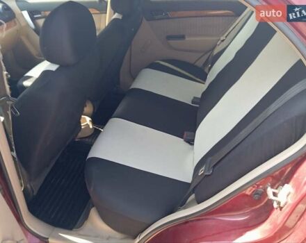 Красный Шевроле Авео, объемом двигателя 1.6 л и пробегом 261 тыс. км за 3600 $, фото 5 на Automoto.ua