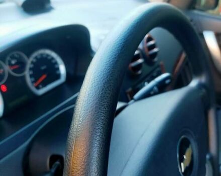 Красный Шевроле Авео, объемом двигателя 1.5 л и пробегом 65 тыс. км за 5500 $, фото 36 на Automoto.ua