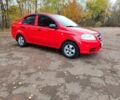 Красный Шевроле Авео, объемом двигателя 1.5 л и пробегом 239 тыс. км за 3200 $, фото 1 на Automoto.ua