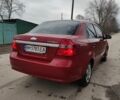 Красный Шевроле Авео, объемом двигателя 1.5 л и пробегом 237 тыс. км за 3900 $, фото 3 на Automoto.ua
