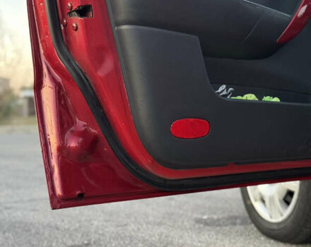 Червоний Шевроле Авео, об'ємом двигуна 1.5 л та пробігом 213 тис. км за 2600 $, фото 16 на Automoto.ua