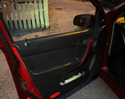 Червоний Шевроле Авео, об'ємом двигуна 1.5 л та пробігом 213 тис. км за 2600 $, фото 27 на Automoto.ua