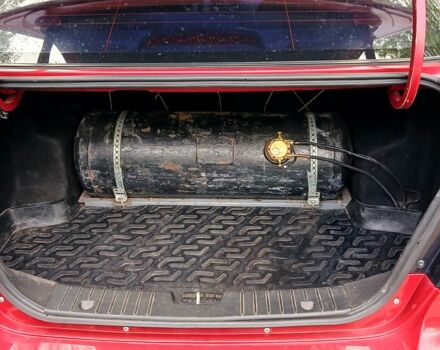 Красный Шевроле Авео, объемом двигателя 1.5 л и пробегом 92 тыс. км за 4200 $, фото 1 на Automoto.ua