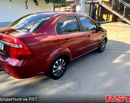 Красный Шевроле Авео, объемом двигателя 1.6 л и пробегом 250 тыс. км за 3500 $, фото 2 на Automoto.ua