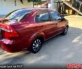 Красный Шевроле Авео, объемом двигателя 1.6 л и пробегом 250 тыс. км за 3500 $, фото 2 на Automoto.ua