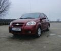 Красный Шевроле Авео, объемом двигателя 1.6 л и пробегом 91 тыс. км за 4800 $, фото 1 на Automoto.ua