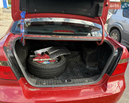 Красный Шевроле Авео, объемом двигателя 1.5 л и пробегом 263 тыс. км за 4500 $, фото 11 на Automoto.ua