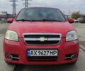 Красный Шевроле Авео, объемом двигателя 1.5 л и пробегом 205 тыс. км за 3300 $, фото 1 на Automoto.ua