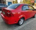 Червоний Шевроле Авео, об'ємом двигуна 1.4 л та пробігом 205 тис. км за 4200 $, фото 7 на Automoto.ua