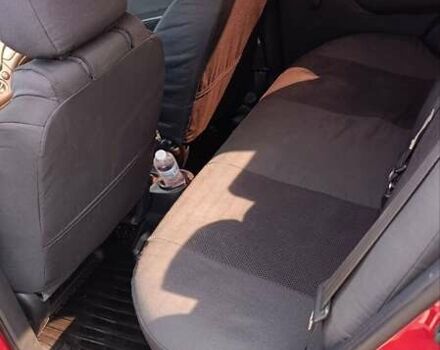 Червоний Шевроле Авео, об'ємом двигуна 1.4 л та пробігом 158 тис. км за 5100 $, фото 11 на Automoto.ua