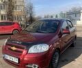 Красный Шевроле Авео, объемом двигателя 1.6 л и пробегом 173 тыс. км за 3800 $, фото 1 на Automoto.ua