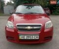 Красный Шевроле Авео, объемом двигателя 1.5 л и пробегом 320 тыс. км за 3400 $, фото 1 на Automoto.ua