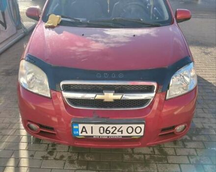 Красный Шевроле Авео, объемом двигателя 1.5 л и пробегом 171 тыс. км за 3700 $, фото 1 на Automoto.ua