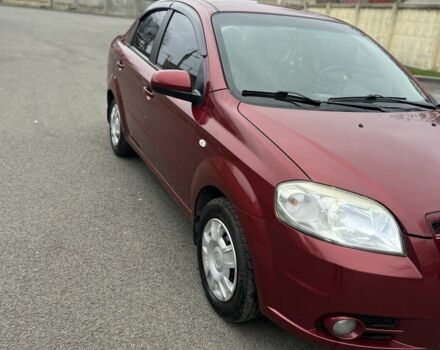Красный Шевроле Авео, объемом двигателя 1.6 л и пробегом 210 тыс. км за 4300 $, фото 1 на Automoto.ua