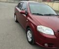 Красный Шевроле Авео, объемом двигателя 1.6 л и пробегом 210 тыс. км за 4300 $, фото 1 на Automoto.ua