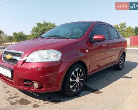 Красный Шевроле Авео, объемом двигателя 1.6 л и пробегом 261 тыс. км за 3600 $, фото 1 на Automoto.ua