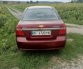 Красный Шевроле Авео, объемом двигателя 1.6 л и пробегом 197 тыс. км за 3900 $, фото 2 на Automoto.ua