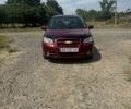 Красный Шевроле Авео, объемом двигателя 1.6 л и пробегом 173 тыс. км за 5100 $, фото 1 на Automoto.ua