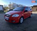 Красный Шевроле Авео, объемом двигателя 1.5 л и пробегом 250 тыс. км за 3600 $, фото 1 на Automoto.ua